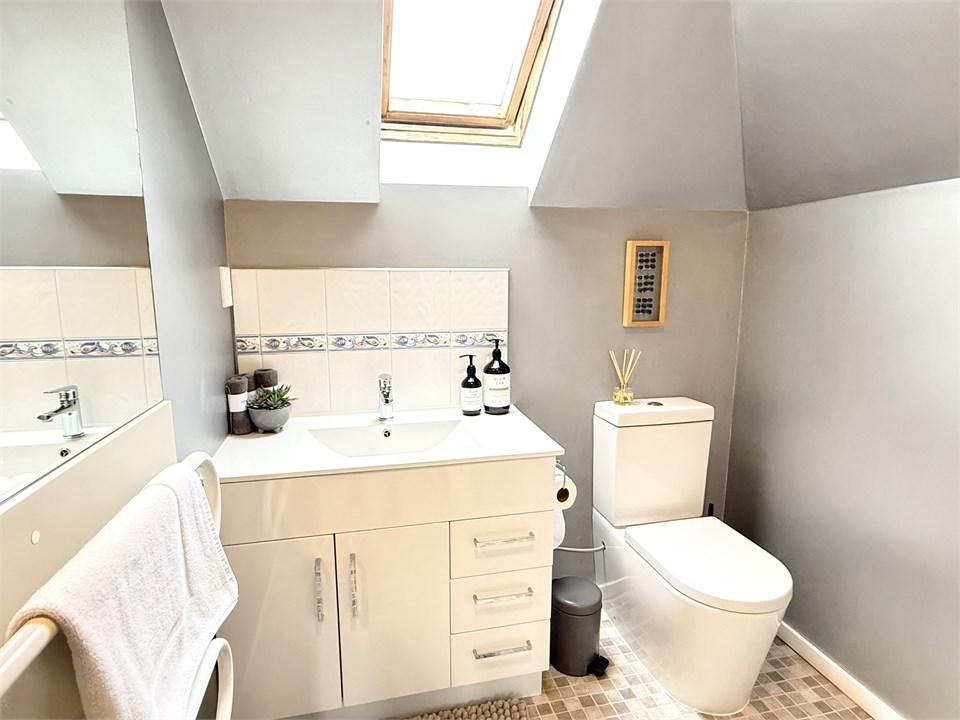 Bathroom 1 has a shower and a toilet (3rd floor)