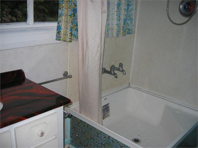 Bathroom with chub shower