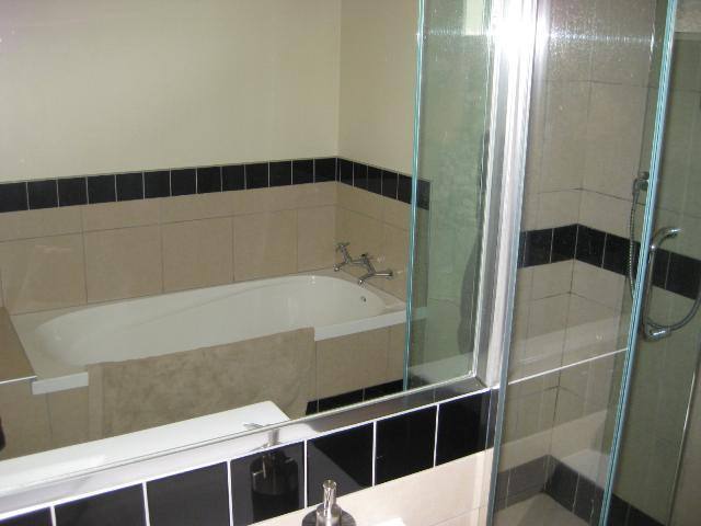 Main bathroom has separate shower and bath