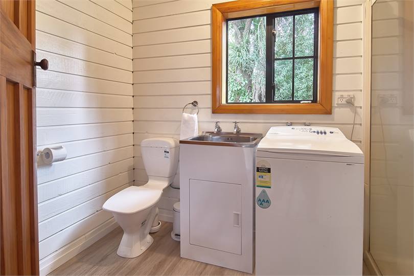 Laundry with toilet and another shower!