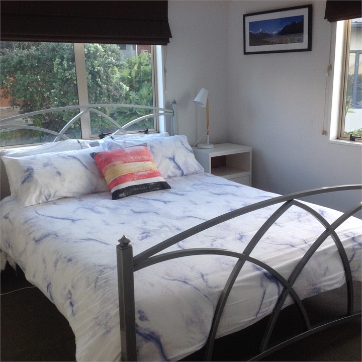 Bedroom 2:upstairs queen bedroom. Bedrooms divided