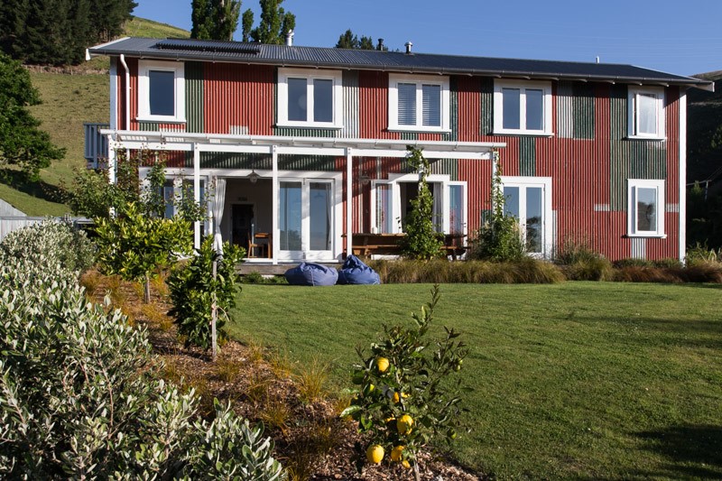 The lodge lawn with lots of fruit trees