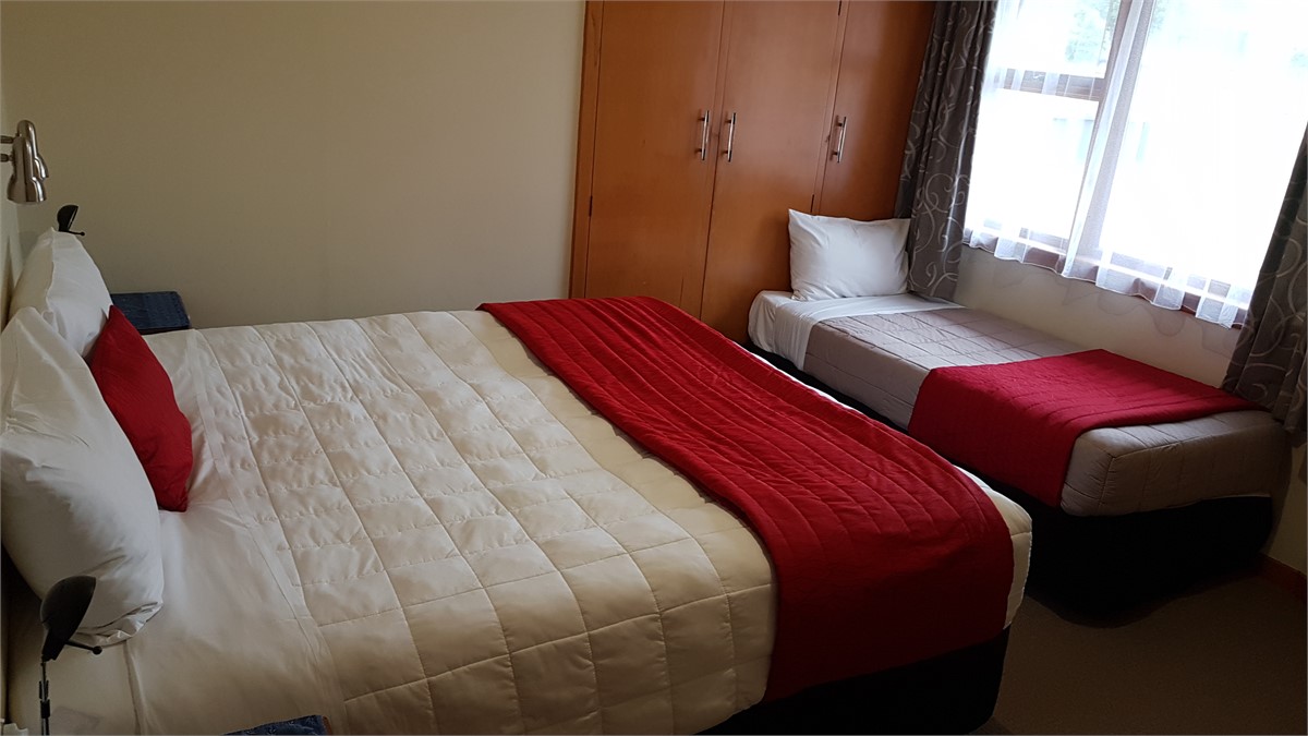 Main bedroom with super king and single