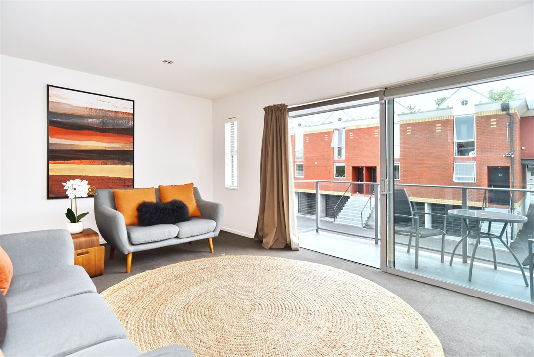 Living area with TV and a Balcony