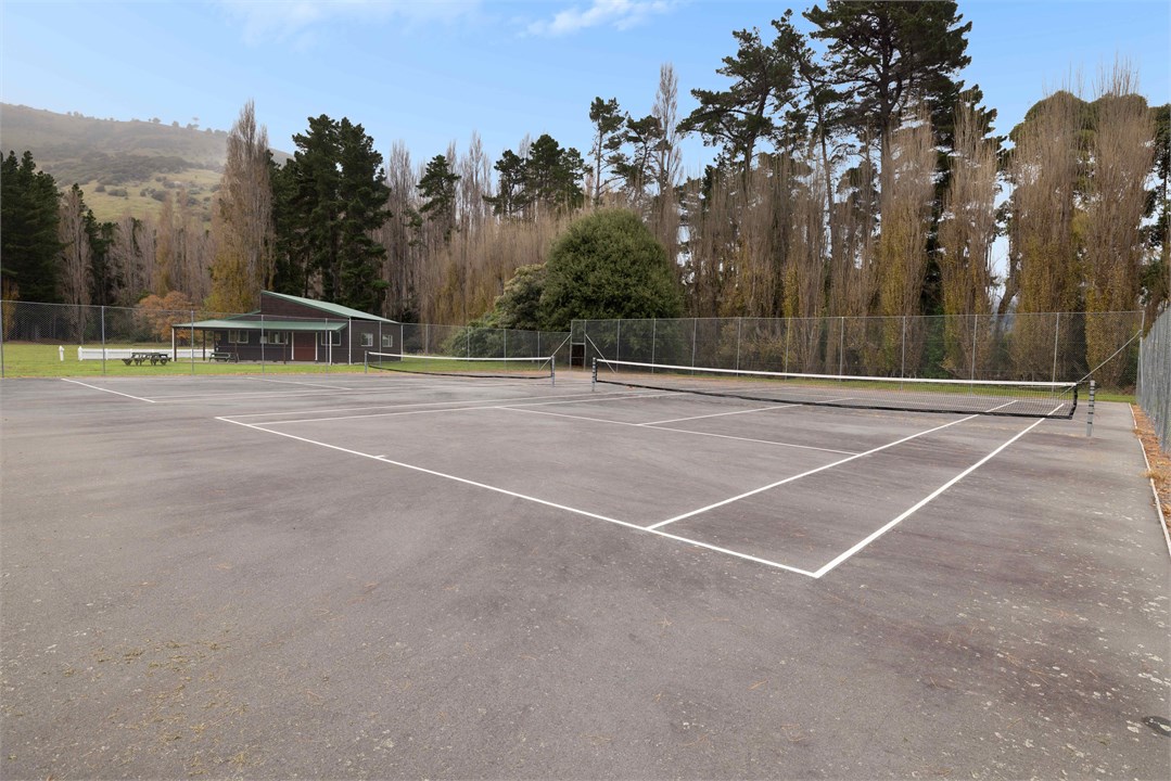 Tennis courts, basketball, cricket area and playgr