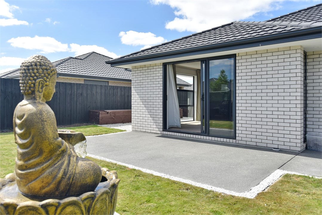 View of the property building and backyard