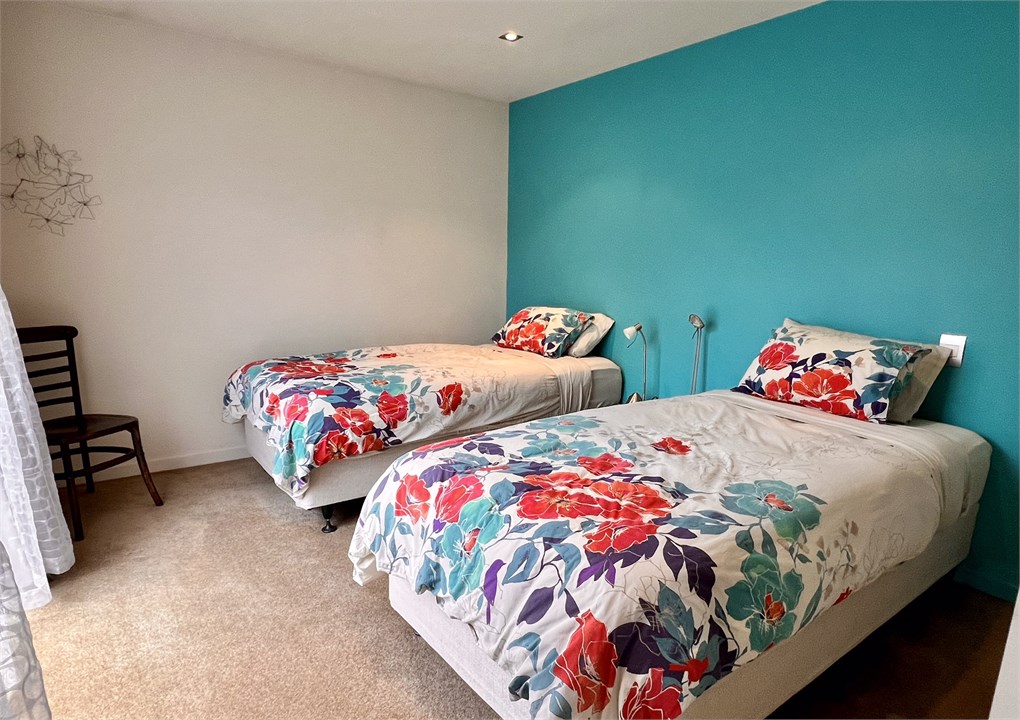 Bedroom 4 has 2 king single beds