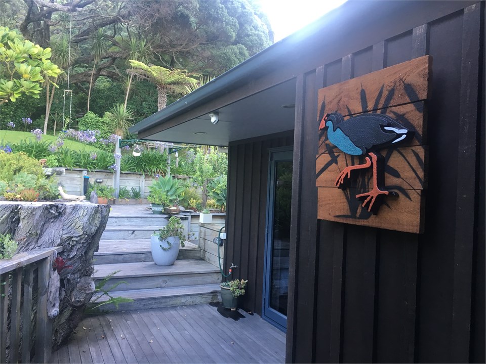 Bush backdrop behind the house