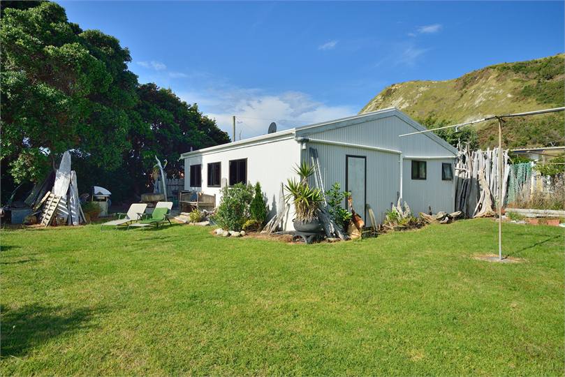 Side lawn and Sunset Shack