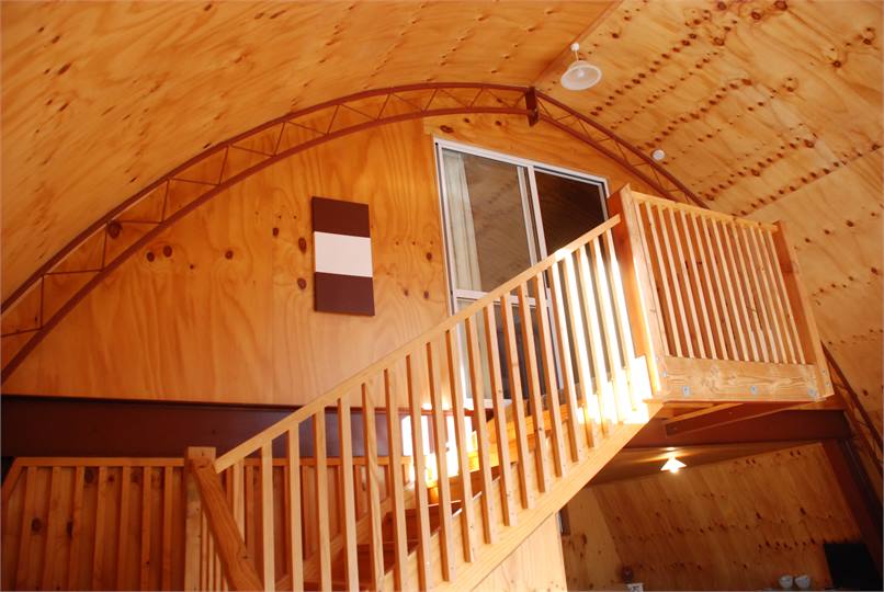 Stairs leading up to the bedroom.