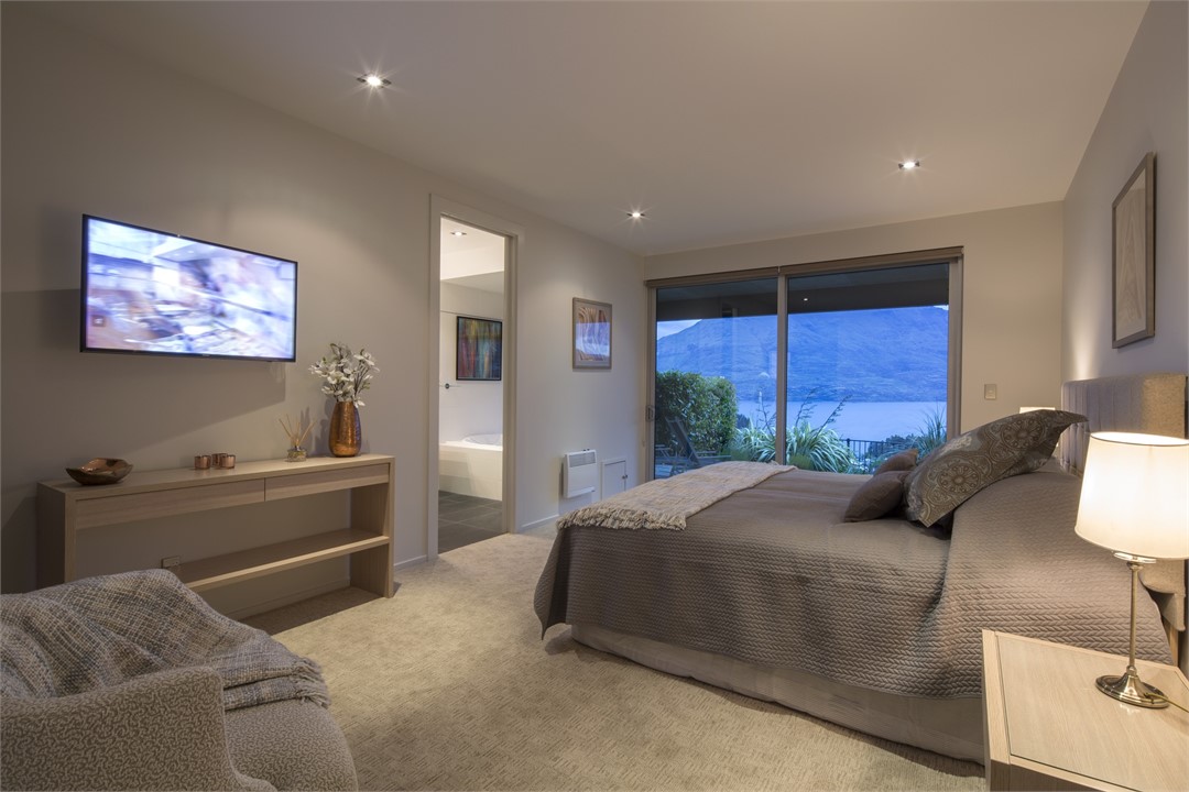 Bedrooms 2 & 3 have lake views and patio access