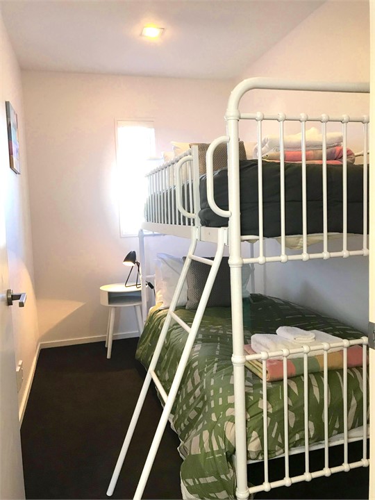Bedroom 3 has a set of bunk beds