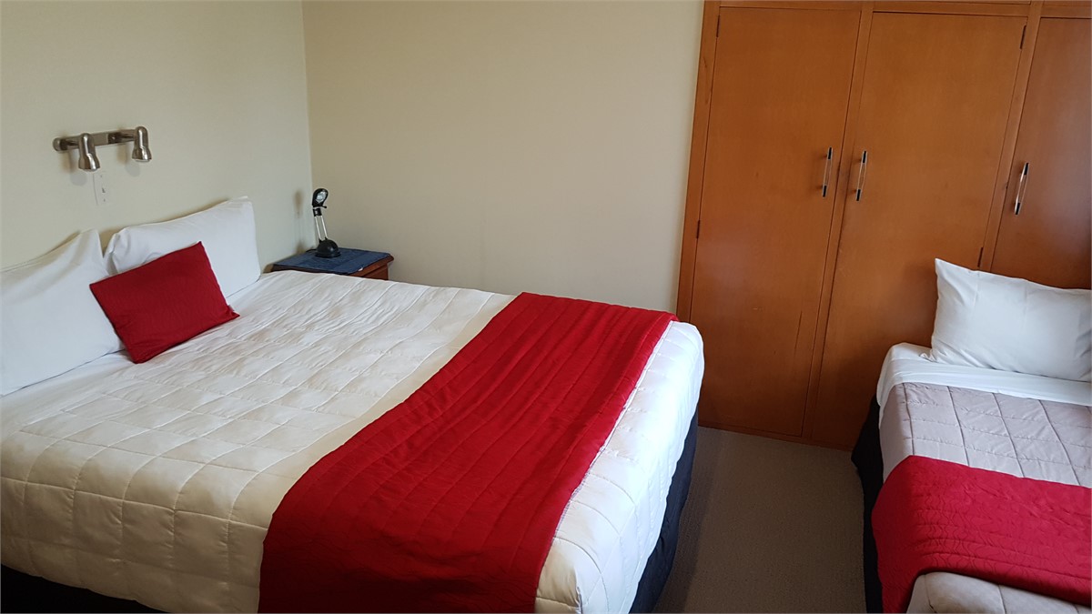 Main bedroom with super king and single