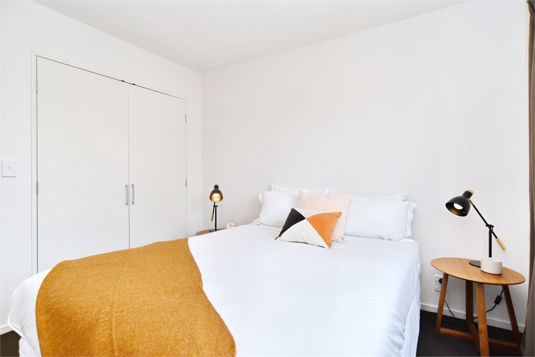 Bedroom 2 has a Queen bed