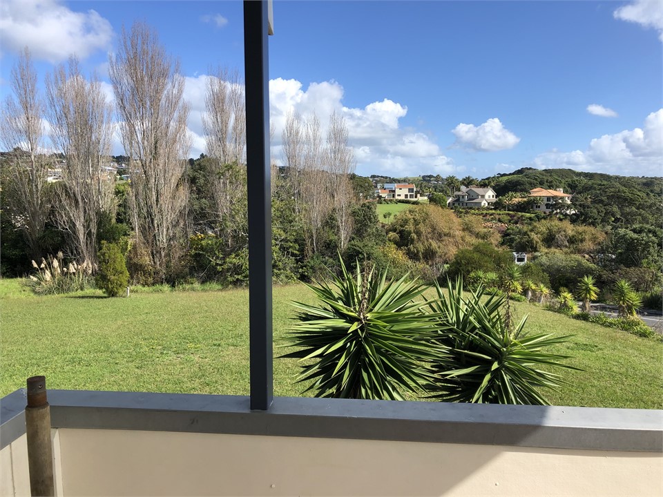 Upstairs balcony view across reserve