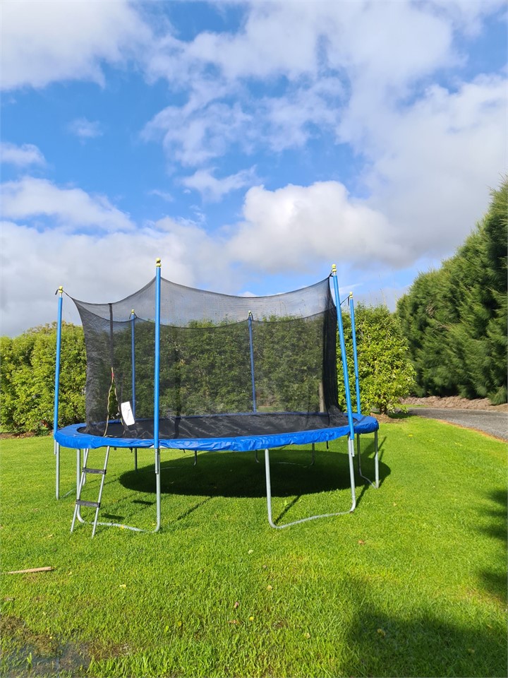 Trampoline with safety pads and safety net