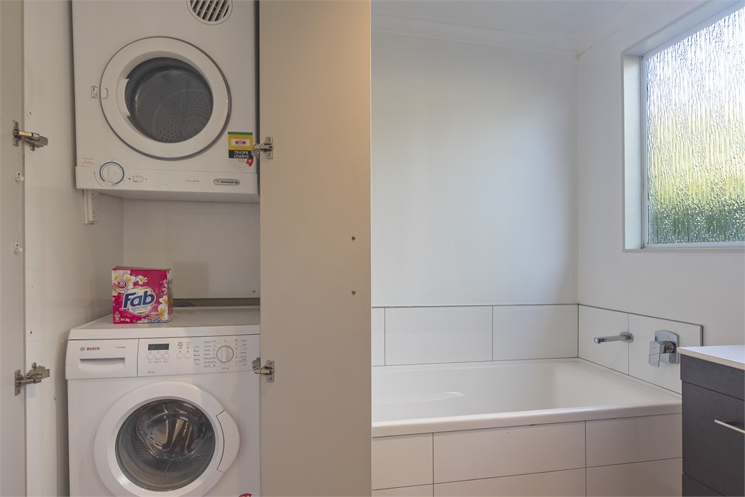 Bathroom with Bath & Separate Shower & Laundry