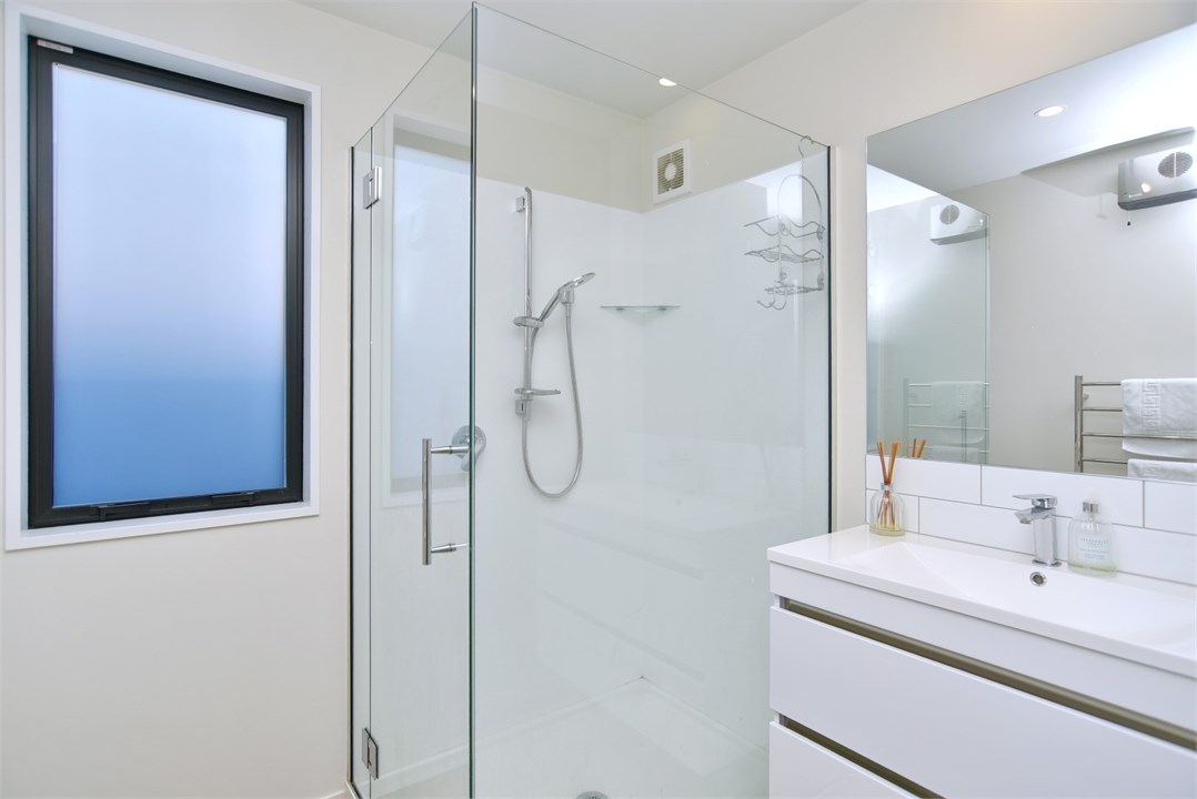 Bathroom has a shower and a toilet