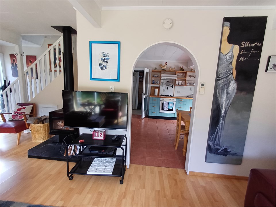 Log fire in the livin area with plenty of firewood