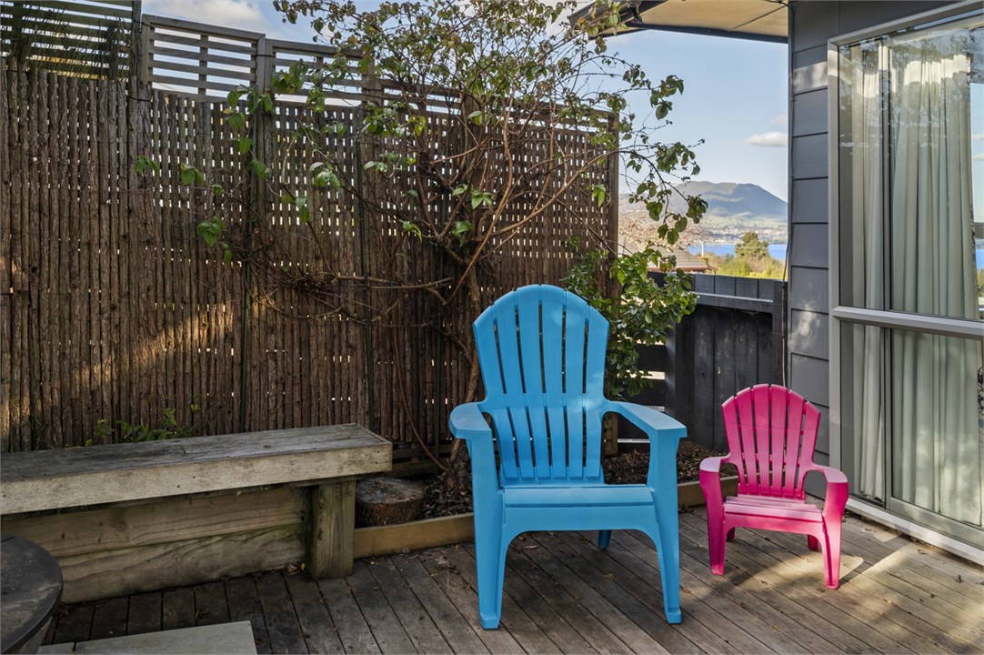 Outdoor entertaining area with a snippet view of M