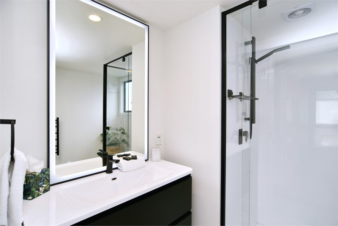 Bathroom has a shower and a toilet