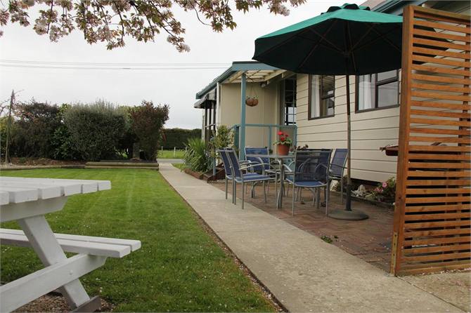 Side view of Cottage garden and BBQ area. 