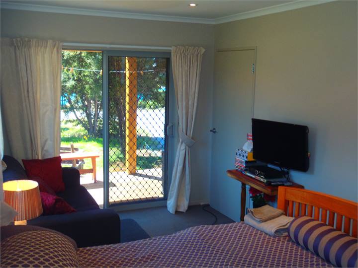 Bedroom contains a sofa bed, views over Lake Hawea
