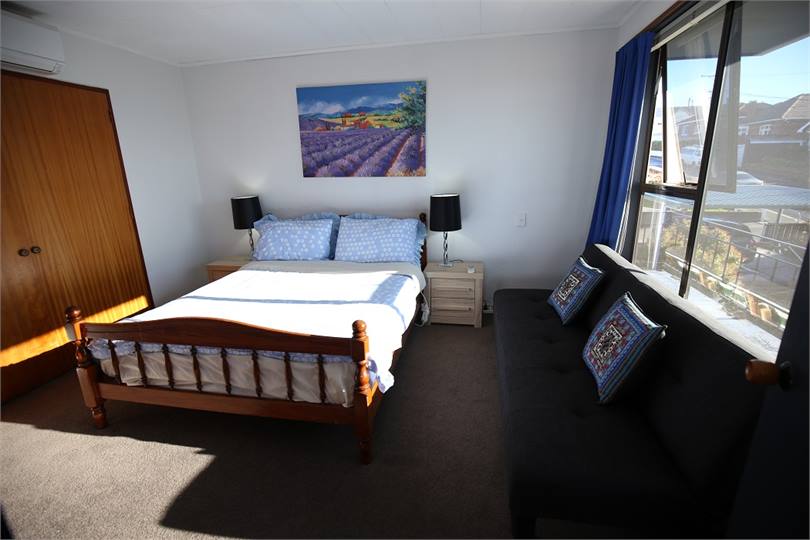 Room 5 with queen bed & sofa bed