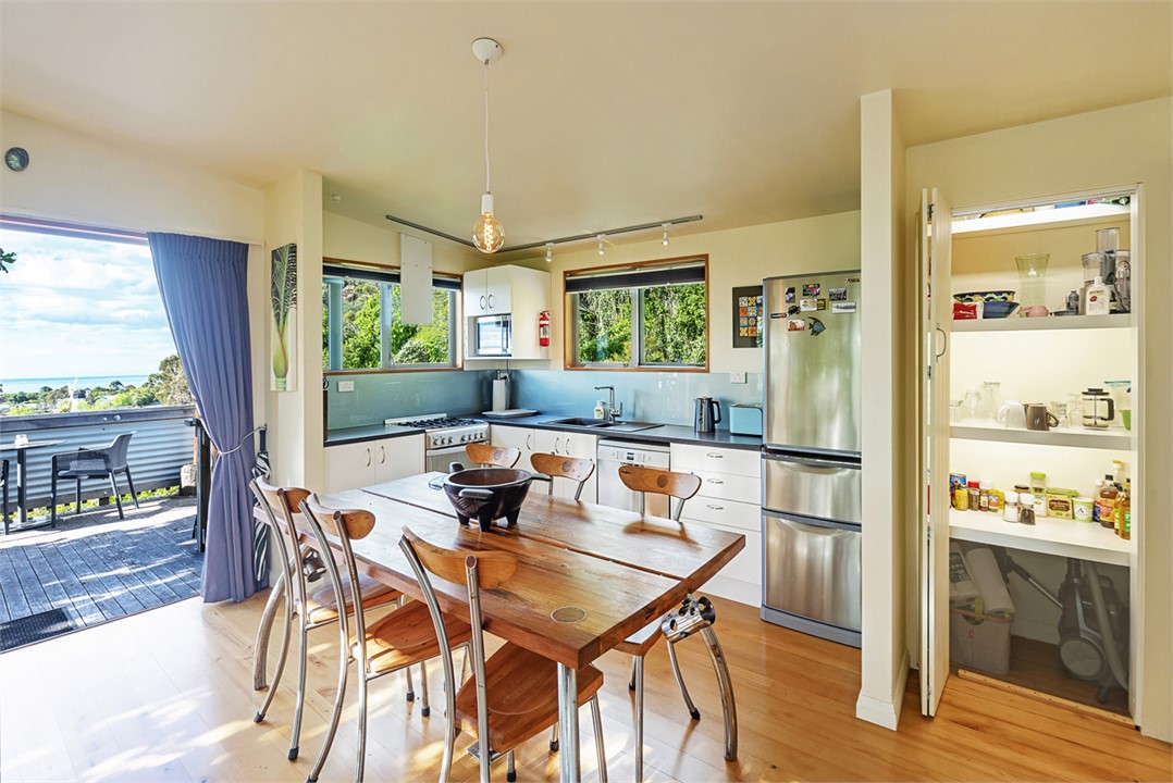 Open fully-equipped Kitchen & Dining area