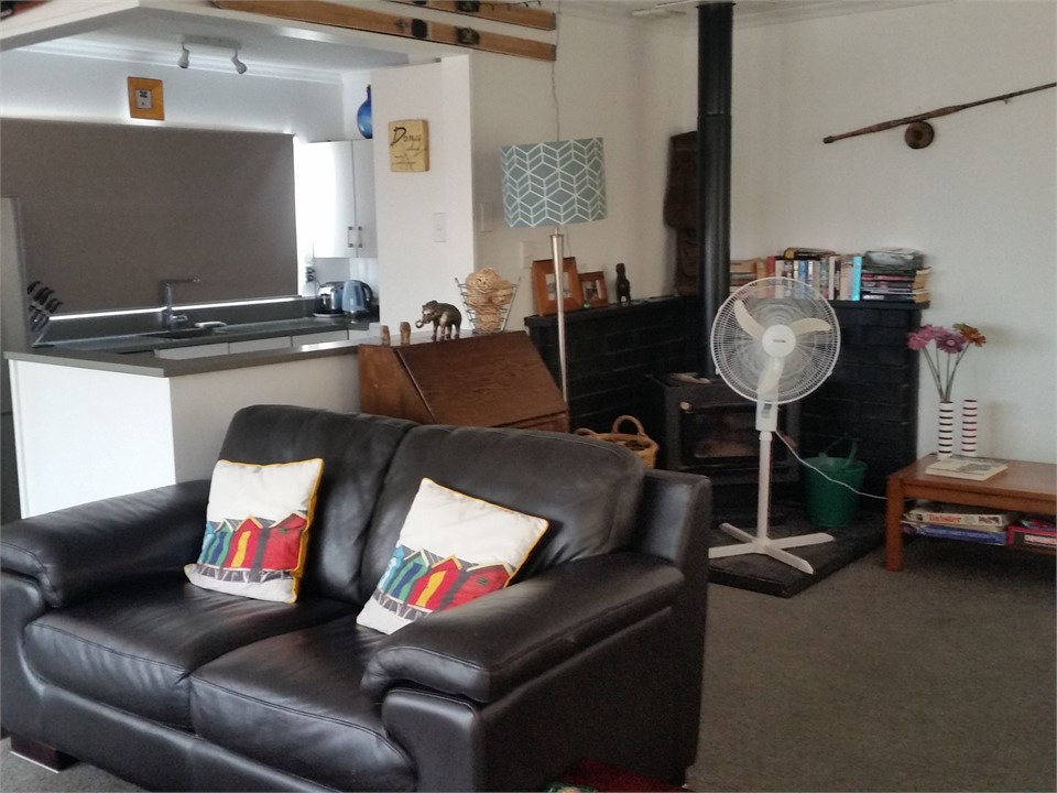 Efficient wood burner heats living area