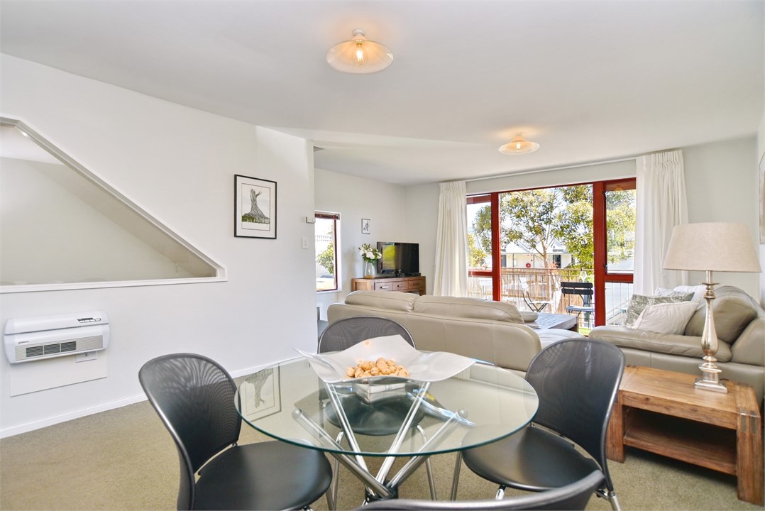 Living room with TV and Dining area