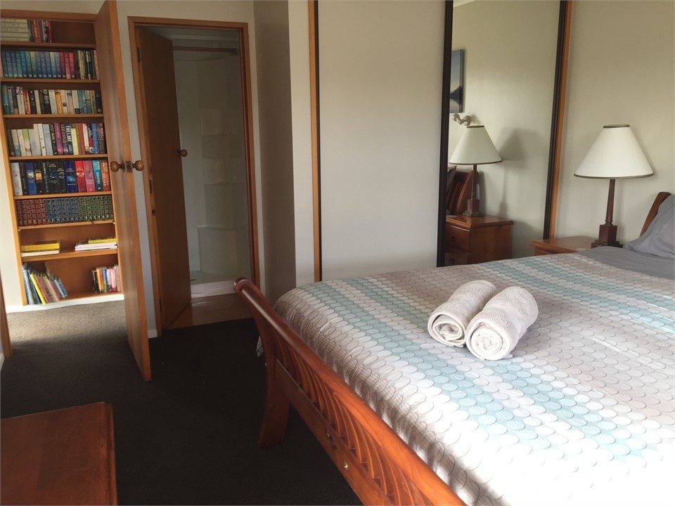 King bed bedroom with ensuite bathroom