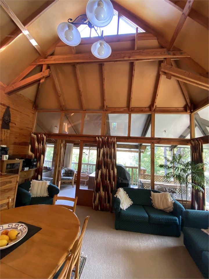 View of main living area with East Deck to right.