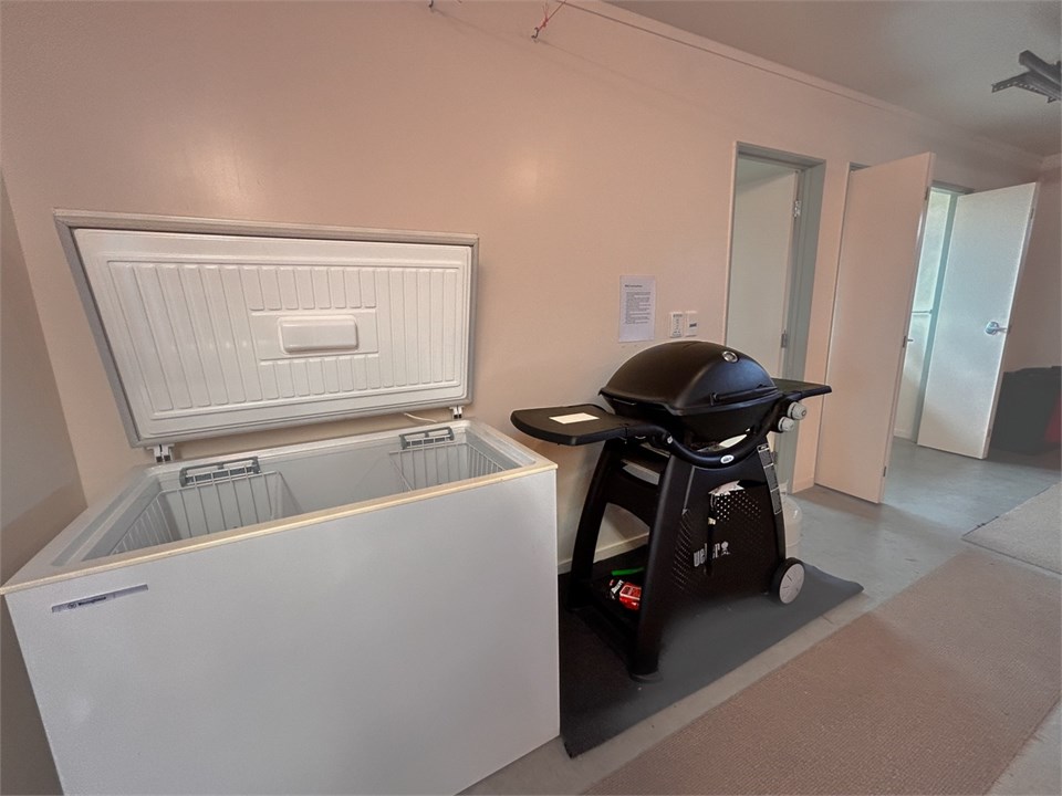 Garage with Deep Freezer, Washer, dryer and Weber 