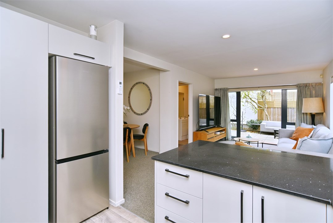 Fully equipped Kitchen area with seating at the be