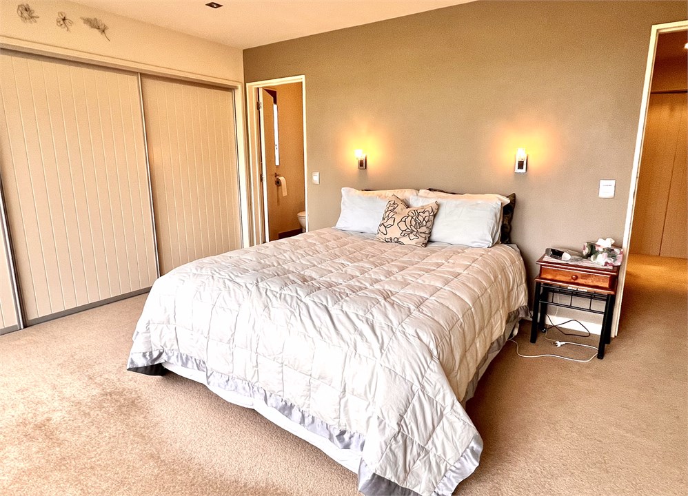 Bedroom 1 has a Queen bed