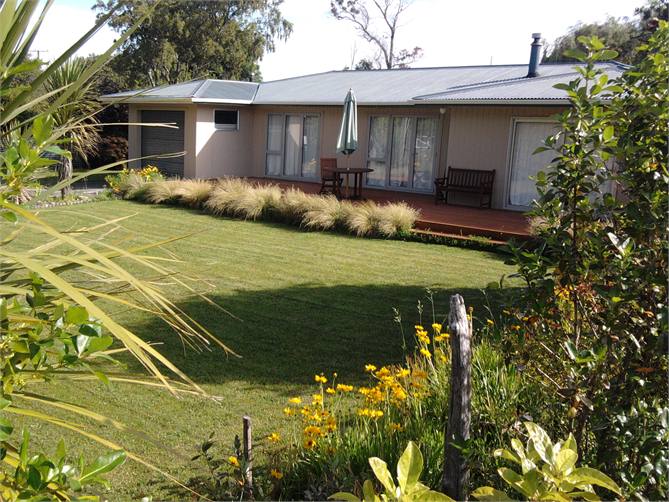 Front of house, deck and lawn