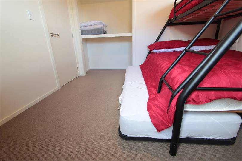 Trundler bed rolls out.