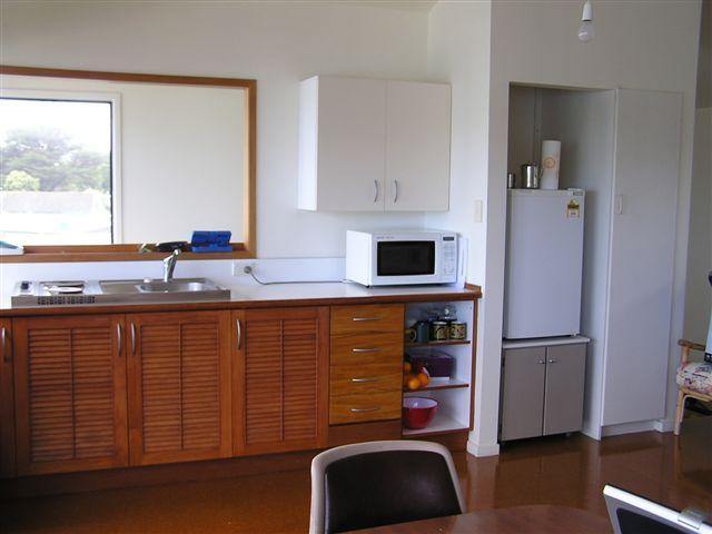 upstairs is a comined  kitchenette,bedsit and deck
