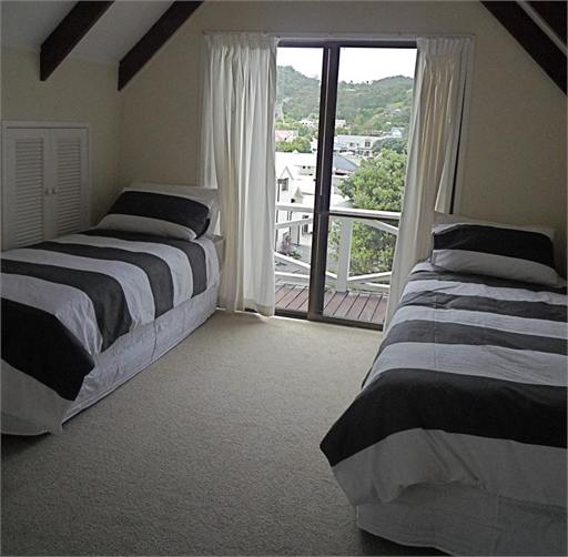 First bedroom with King Bed and 2 singles