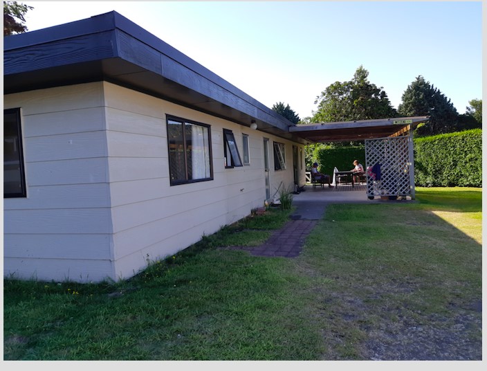 Plenty of parking for cars and a boat.