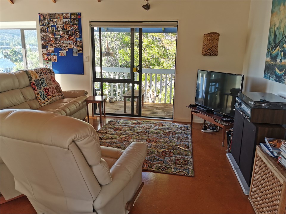 Open plan living with leather furniture and large 