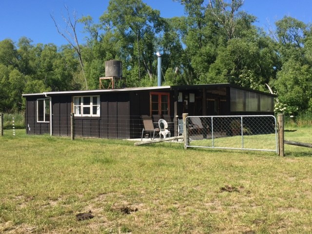 Fully fence around cottage for dogs and small chil