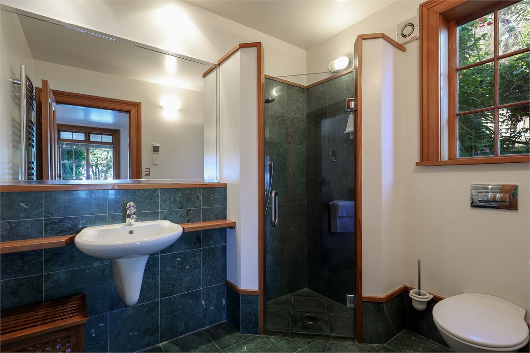 Marble lined bathroom with heated floor and fogles