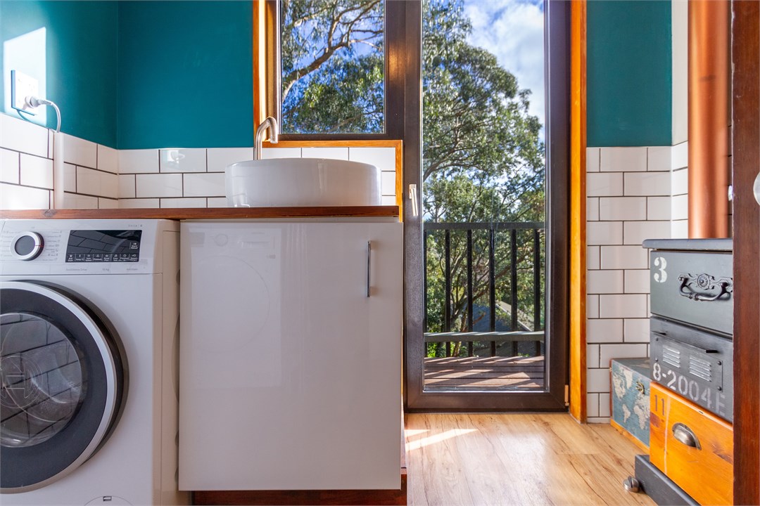 Separate laundry with washer and dryer