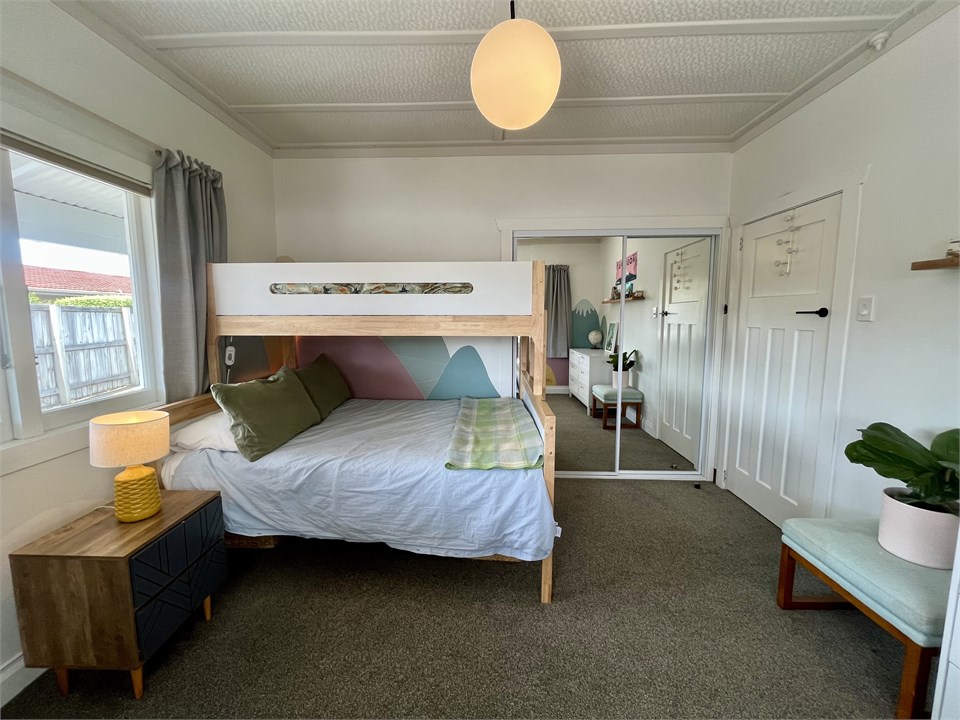 Bunk with double on bottom, single on top.