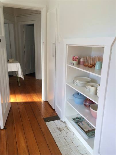 Kitchen through to bedrooms