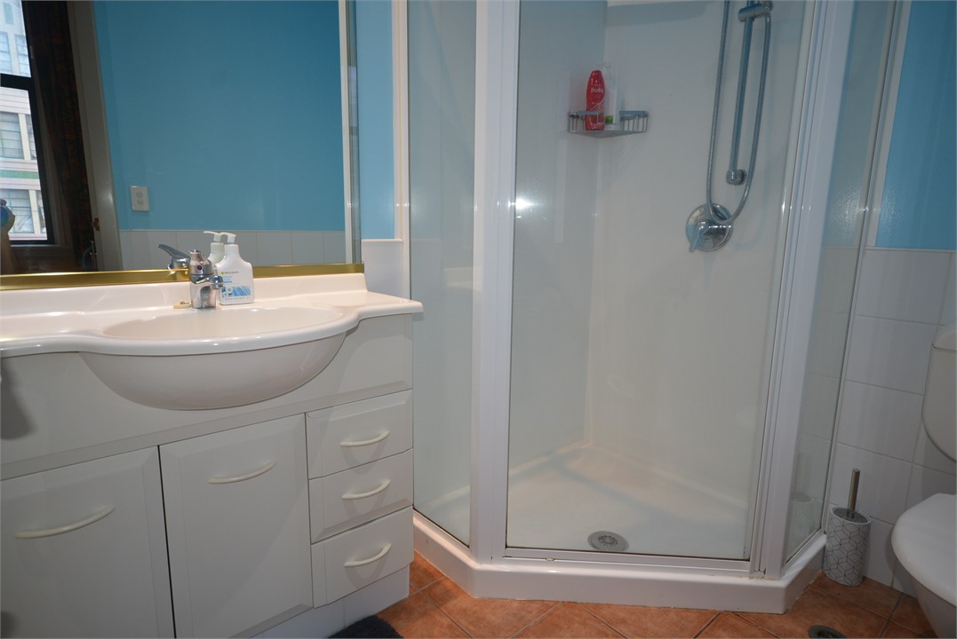 Ensuite bathroom has shower and toilet