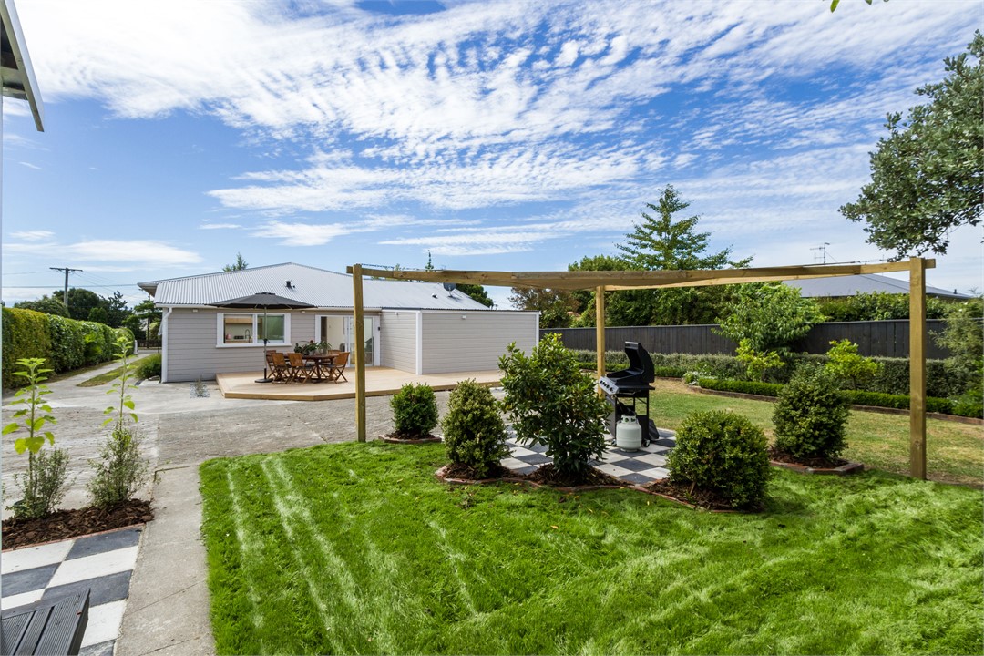 Back garden with large deck and private BBQ area