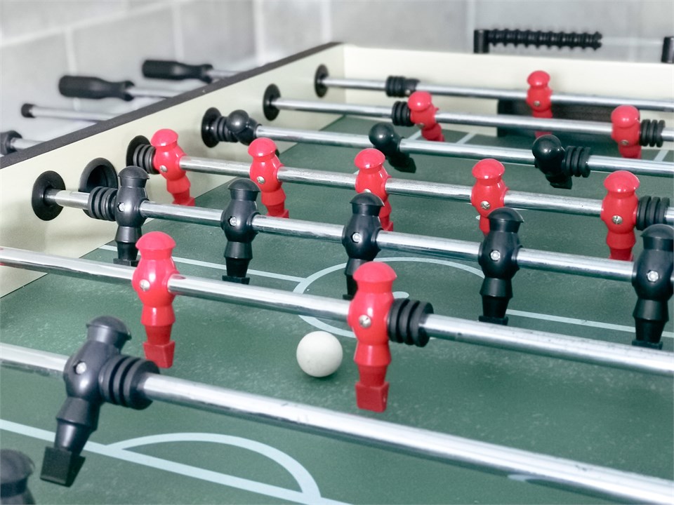 Foosball and table tennis in garage